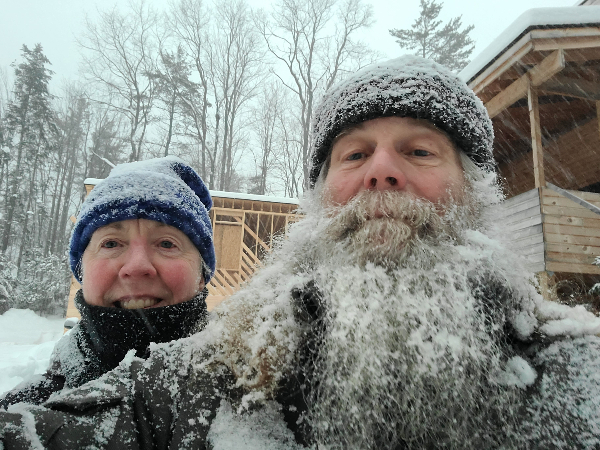 The owner of Jamaiaca Joinery and his wife before our shop under construction